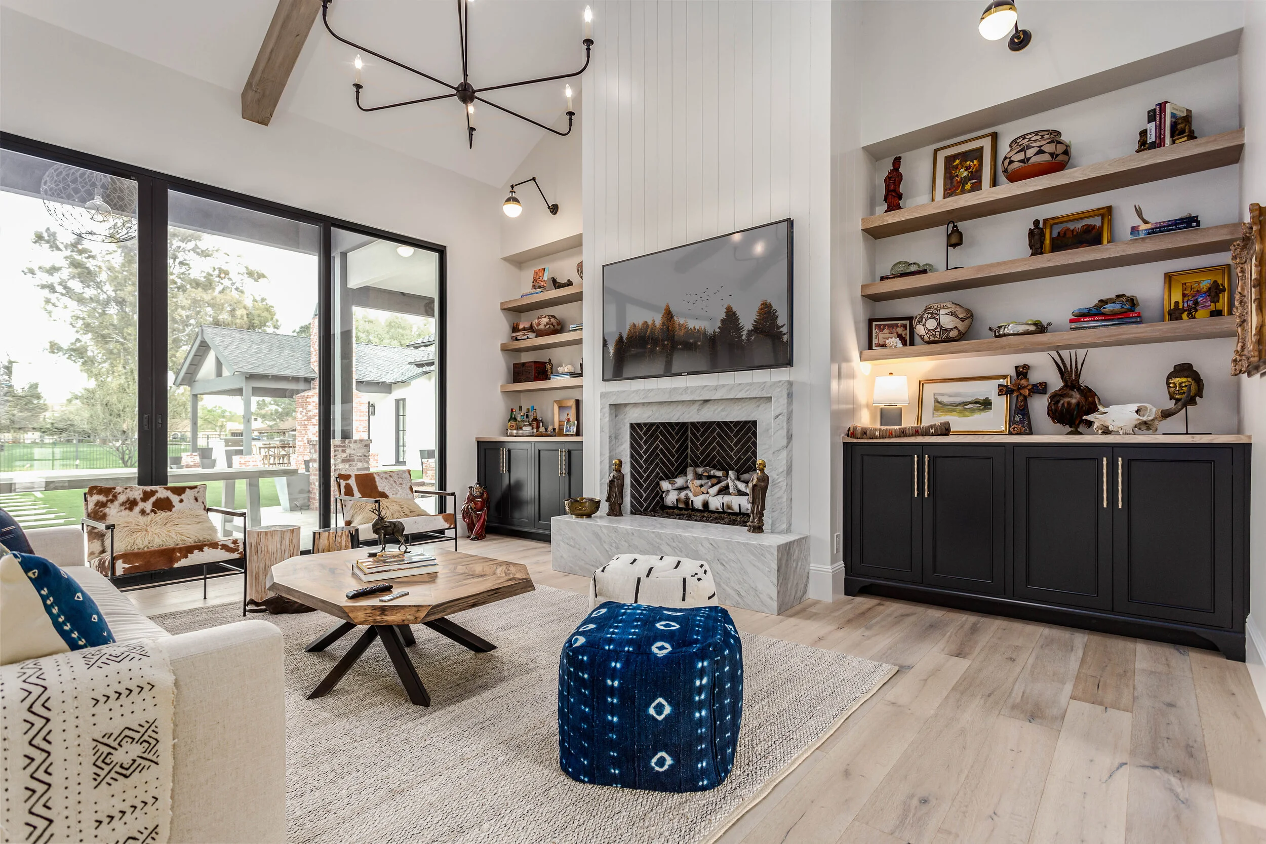 Custom built-in bookcases and entertainment center with walnut cabinetry in Nashville